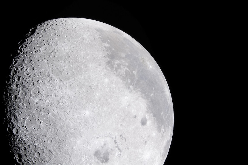 A greyish picture of the moon.
