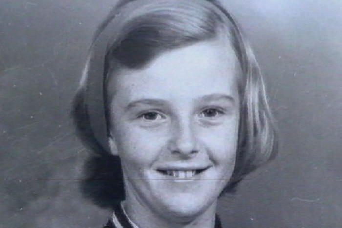 A close-up historic photo of a young woman