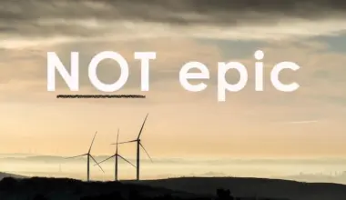 Three silhouetted wind turbines on a misty hill at sunset, with white text reading 'NOT epic' and a black scribble under 'NOT'