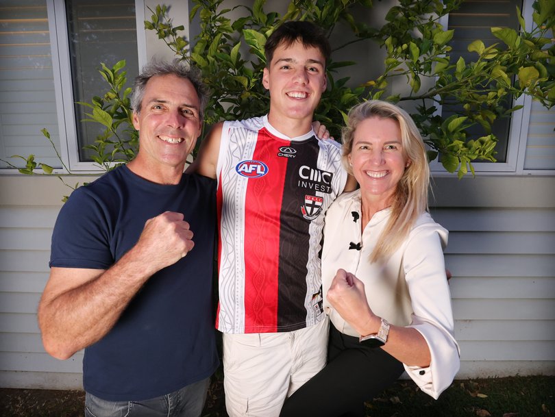Charlie is pictured with dad and former West Coast Eagle legend Drew Banfield and mum Amber.