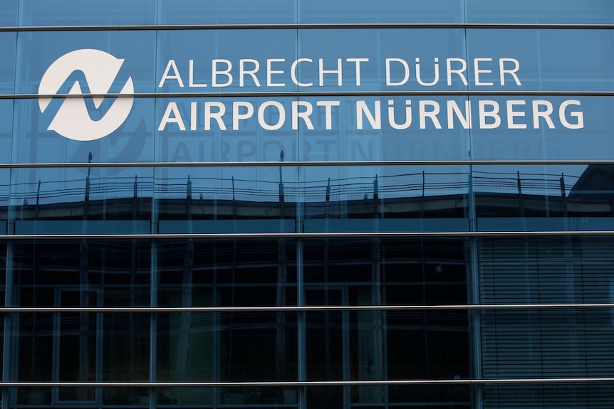 A sign with glass windows