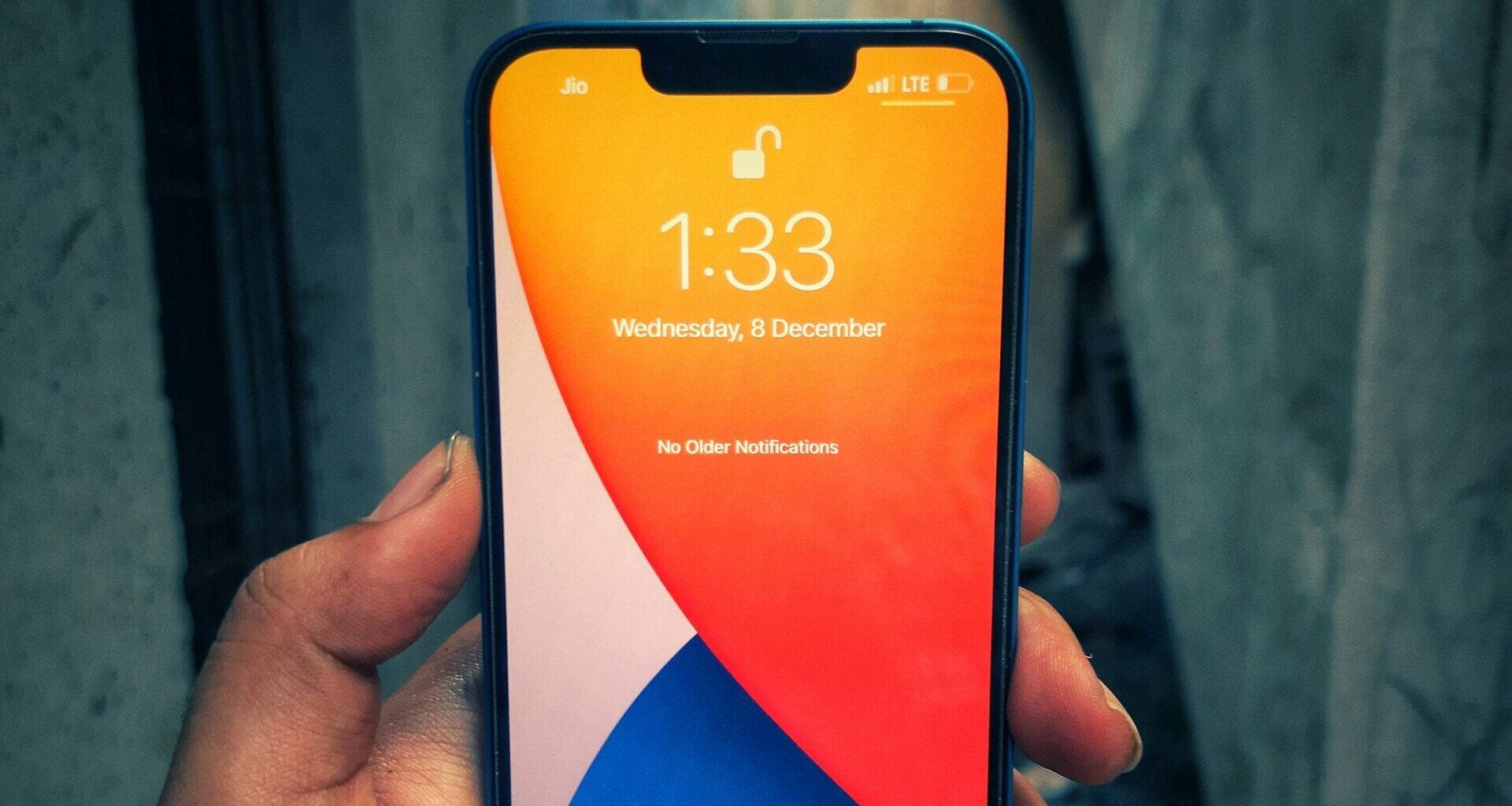 An iPhone displayed with the lock screen