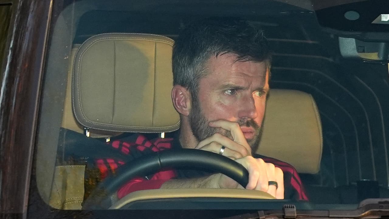 Manchester United soccer team manager Michael Carrick arrives at the team's training center in Manchester, England.