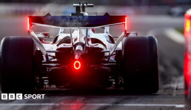 Charles Leclerc's Ferrari accelerates out of the pits at the 2026 Hungarian Grand Prix