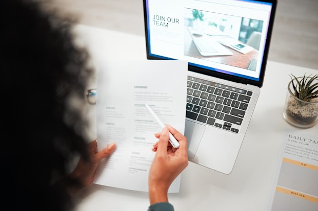 Employer reading a resume
