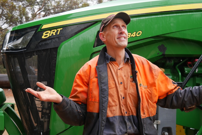 A farmer welcomes the rain.