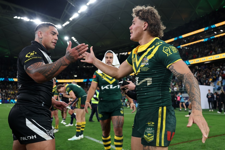Two men embrace after a Test match