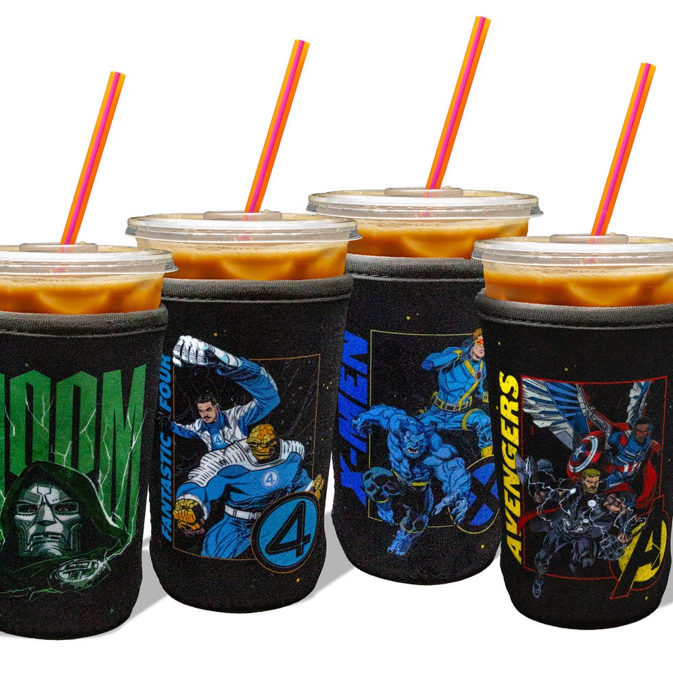 Four beverage cups with comic book designs featuring superheroes and villains, each with colorful straws. Four beverage cups with comic book designs featuring superheroes and villains, each with colorful straws.
