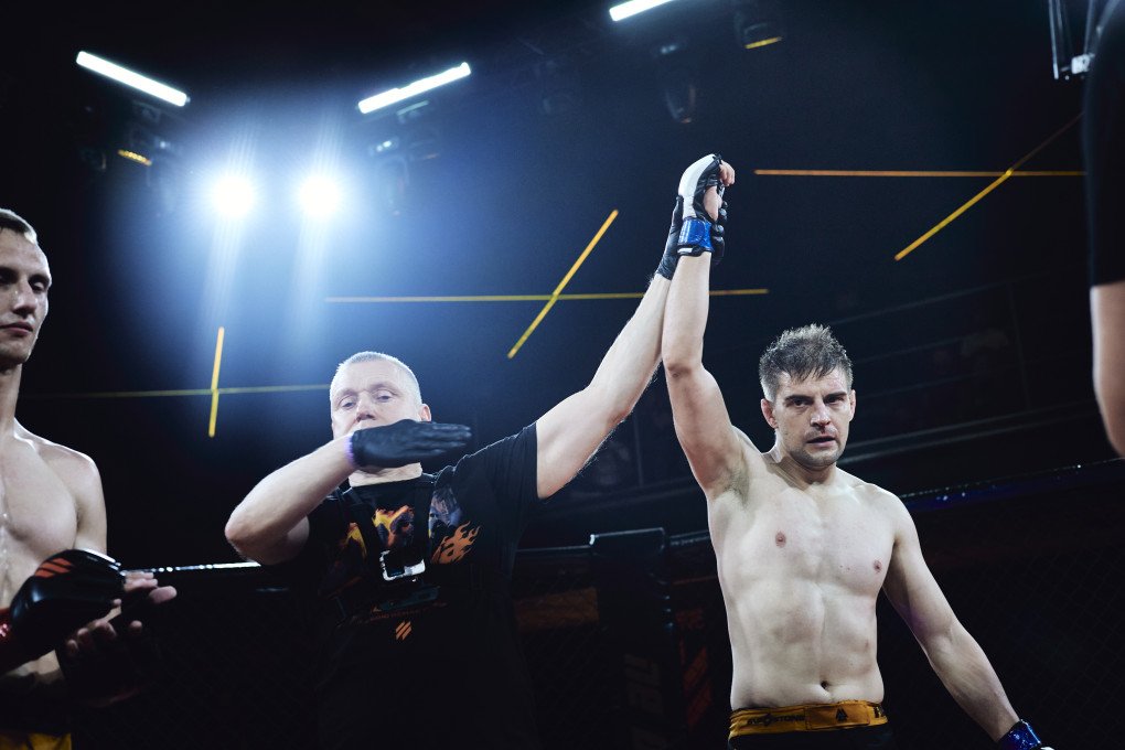 The Finnish MMA fighter and Ukraine’s serviceman Paatola Perttu-Veli is declared winner on Hlib Kush, Ukrainian serviceman of the Third Army Corps, during the international MMA competition “IDU NA VY: Tryzna.” Kyiv, Ukraine, October 9, 2026. (Photo: Louis Beaudemont/UNITED24 Media)