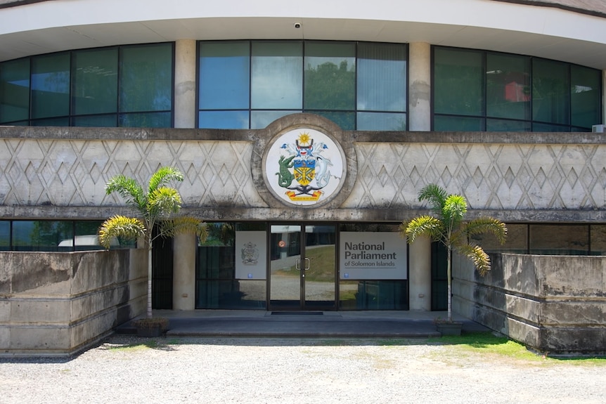 An exterior photo of the front of the Solomon Islands parliament building.