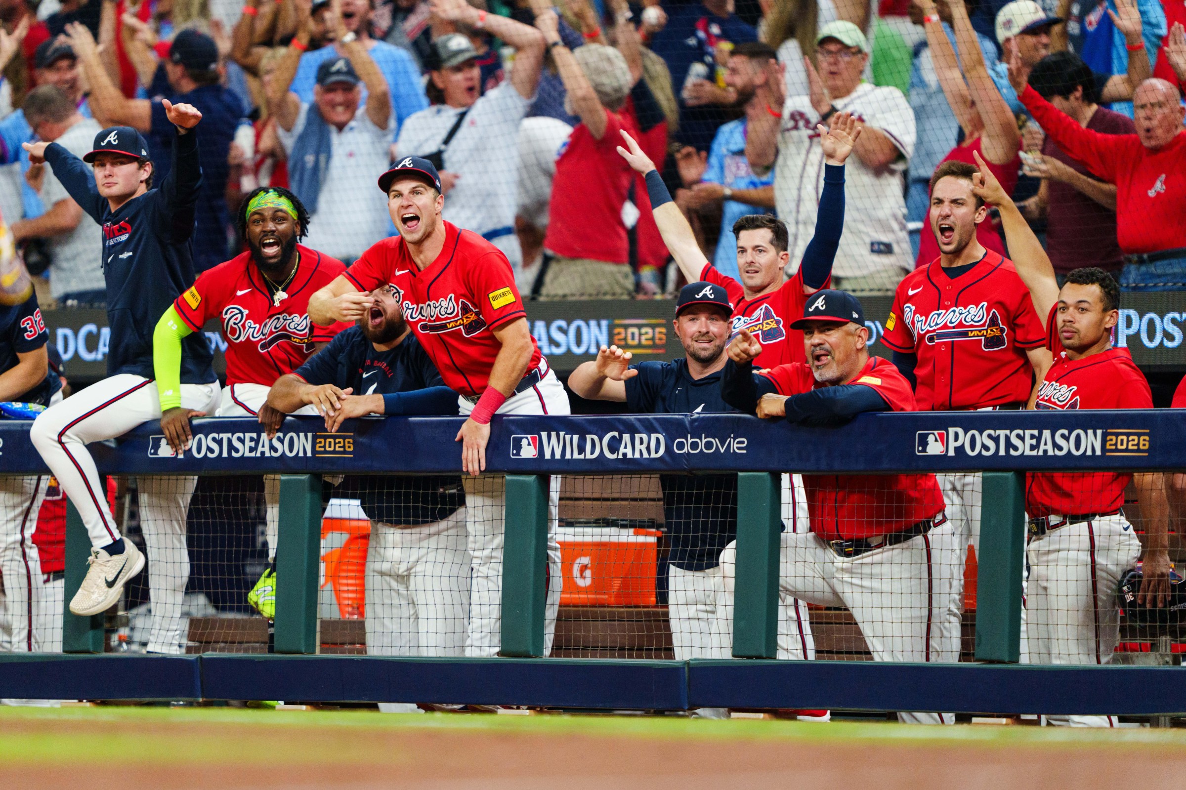 ATLANTA, GA - OCTOBER 01: JR Ritchie #60, Michael Harris II #23, Brewer Hicklen #53, Kyle Farmer #15, Mike Yastrzemski #18, Eddie Pérez #95, Matt Olson #28 and Drake Baldwin #30 of the Atlanta Braves celebrate in the fourth inning during Game Three of the Wild Card Series between the Atlanta Braves and the Philadelphia Phillies at Truist Park on October 1, 2026 in Atlanta, Georgia. (Photo by Matthew Grimes Jr./Atlanta Braves/Getty Images)