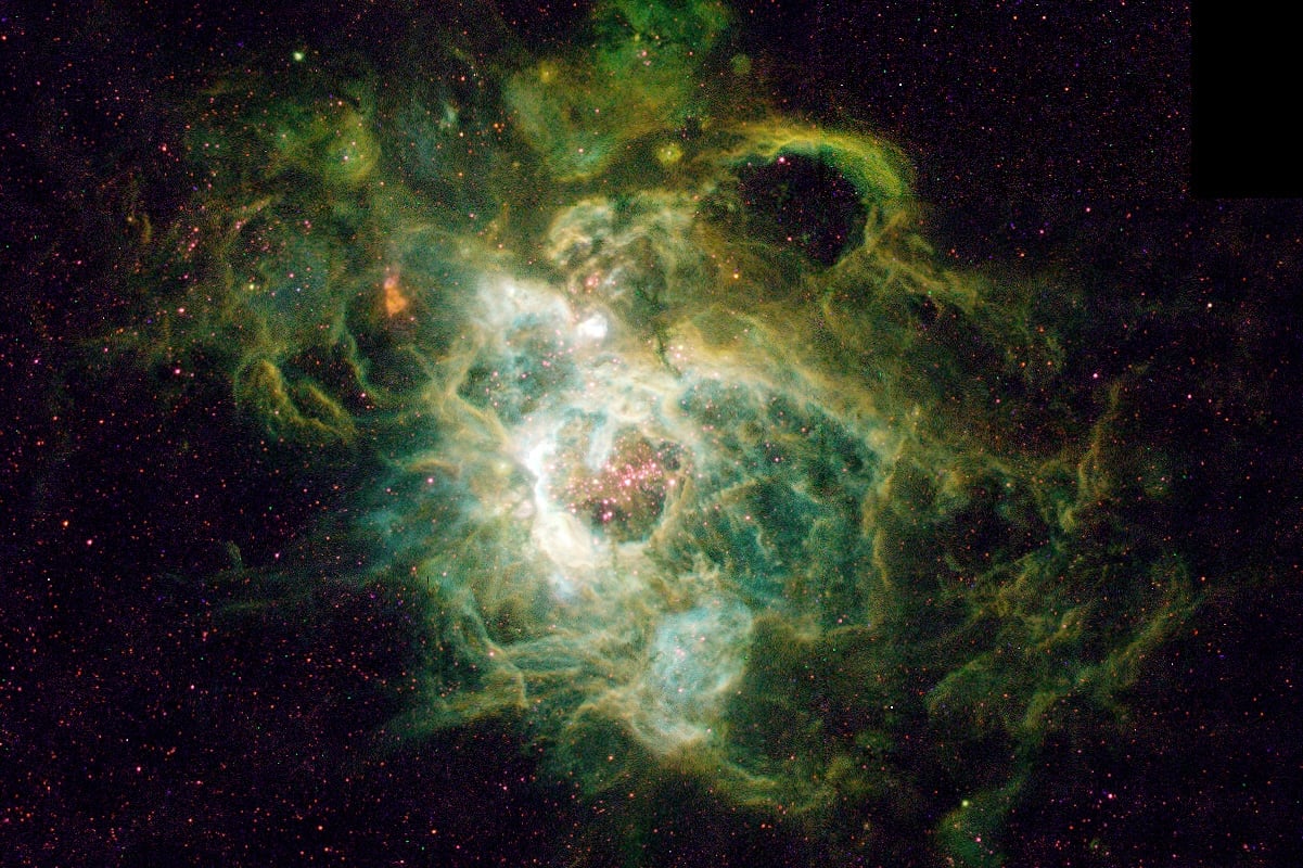Hubble Space Telescope image of a vast nebula called NGC 604, which is rich in helium. Credit: Hui Yang (University of Illinois) and NASA/ESA
