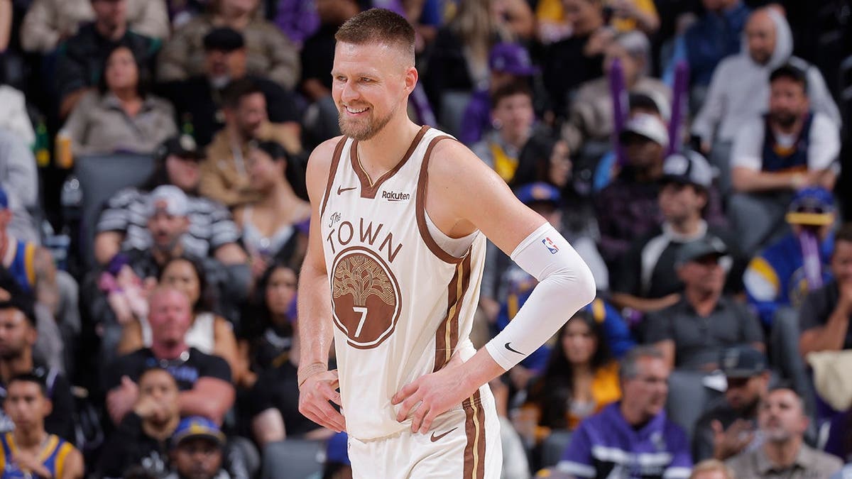Kristaps Porzingis of the Golden State Warriors looks on during a game against the Sacramento Kings.