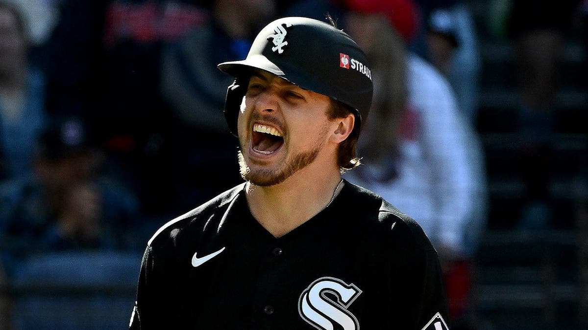 Kyle Teel celebrates after scoring during Game 1 of the American League Division Series in Cleveland.