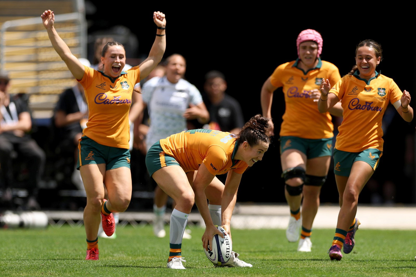 Maya Stewart scores a try for Wallaroos.