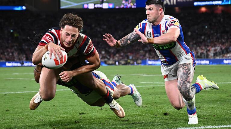 Mark Nawaqanitawase of the Roosters scores a try during the 2026 NRL grand final match between the Sydney Roosters and the Newcastle Knights at Accor Stadium in Sydney, Sunday, October 4, 2026
