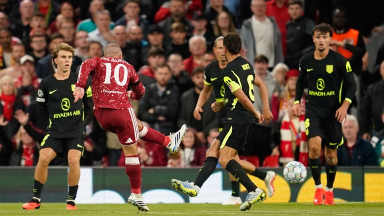 Liverpool's Alexis Mac Allister scores his side's second goal during the Champions League opening phase soccer match against Atletico Madrid