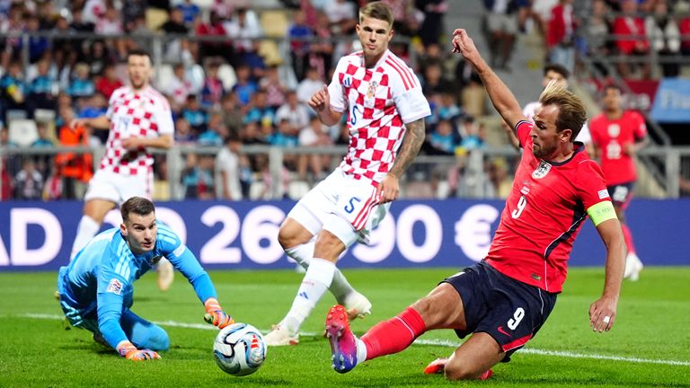 Harry Kane slides in to score England's fifth goal