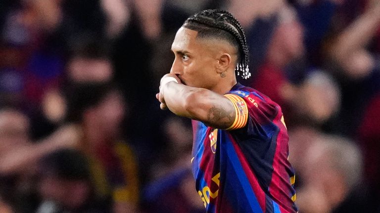 Barcelona's Raphinha celebrates after scoring against Real Madrid