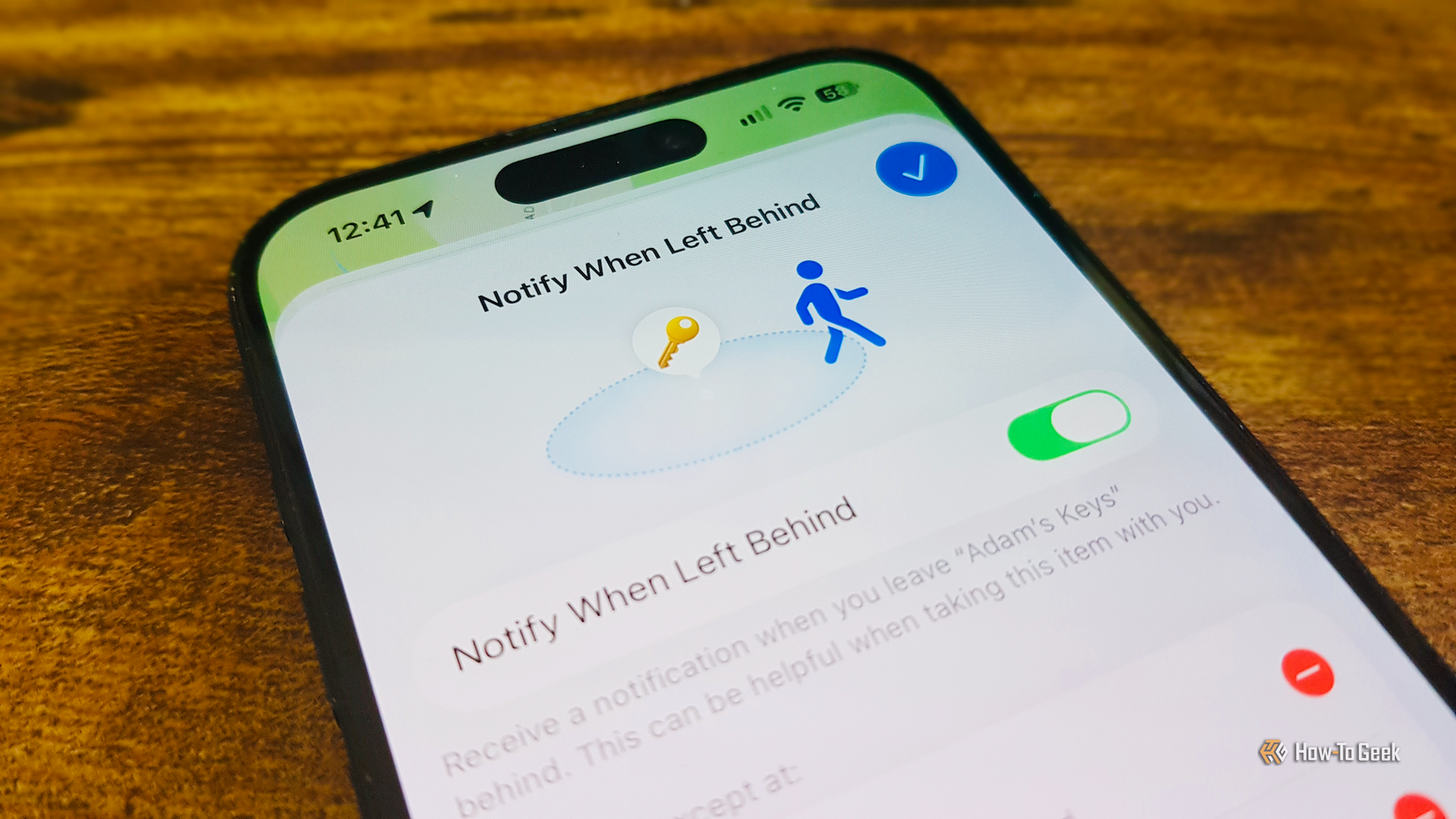 The Notify When Left Behind settings for an AirTag on an iPhone.