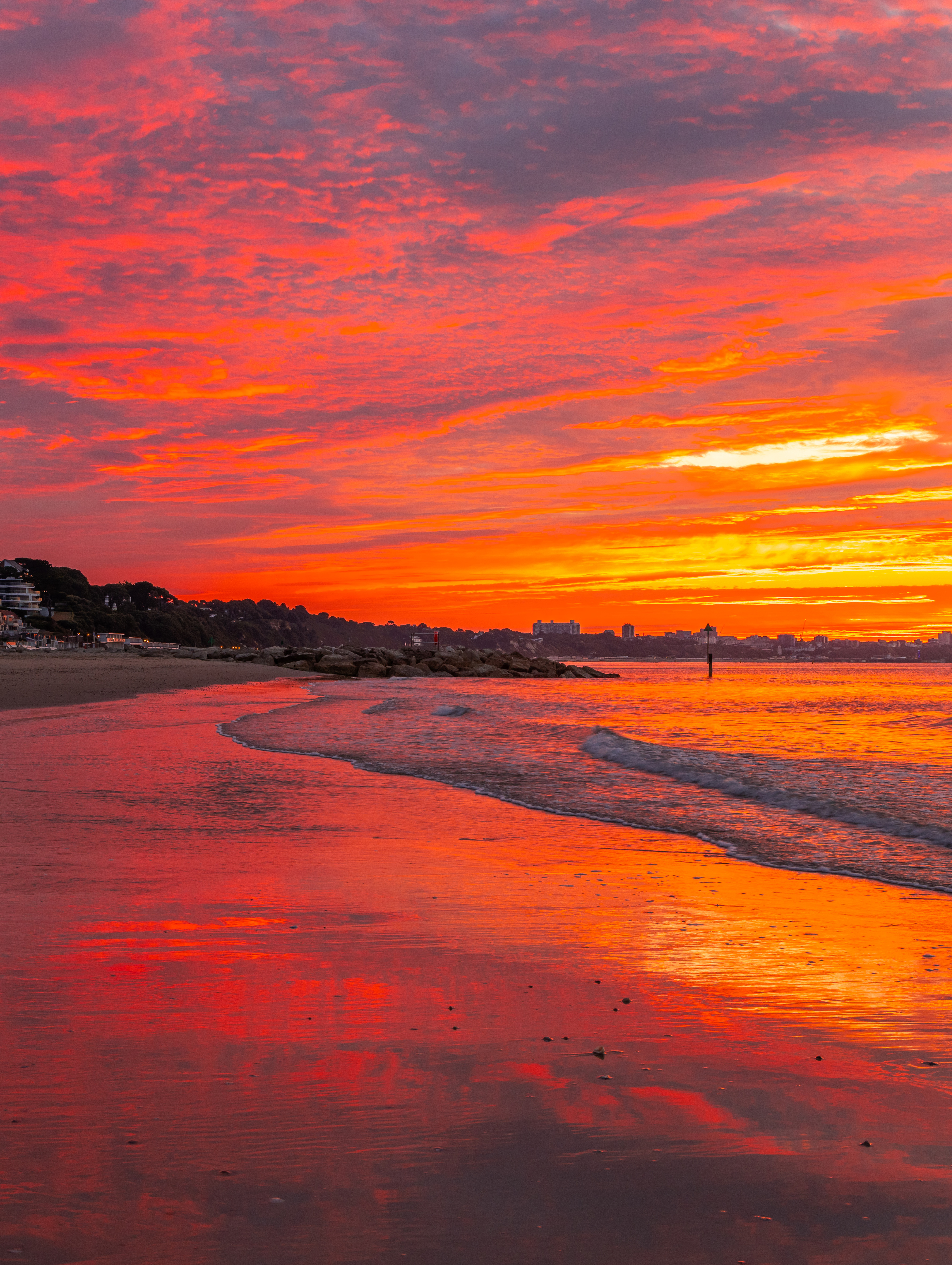 Colourful sunrise at Sandbanks beach in Dorset