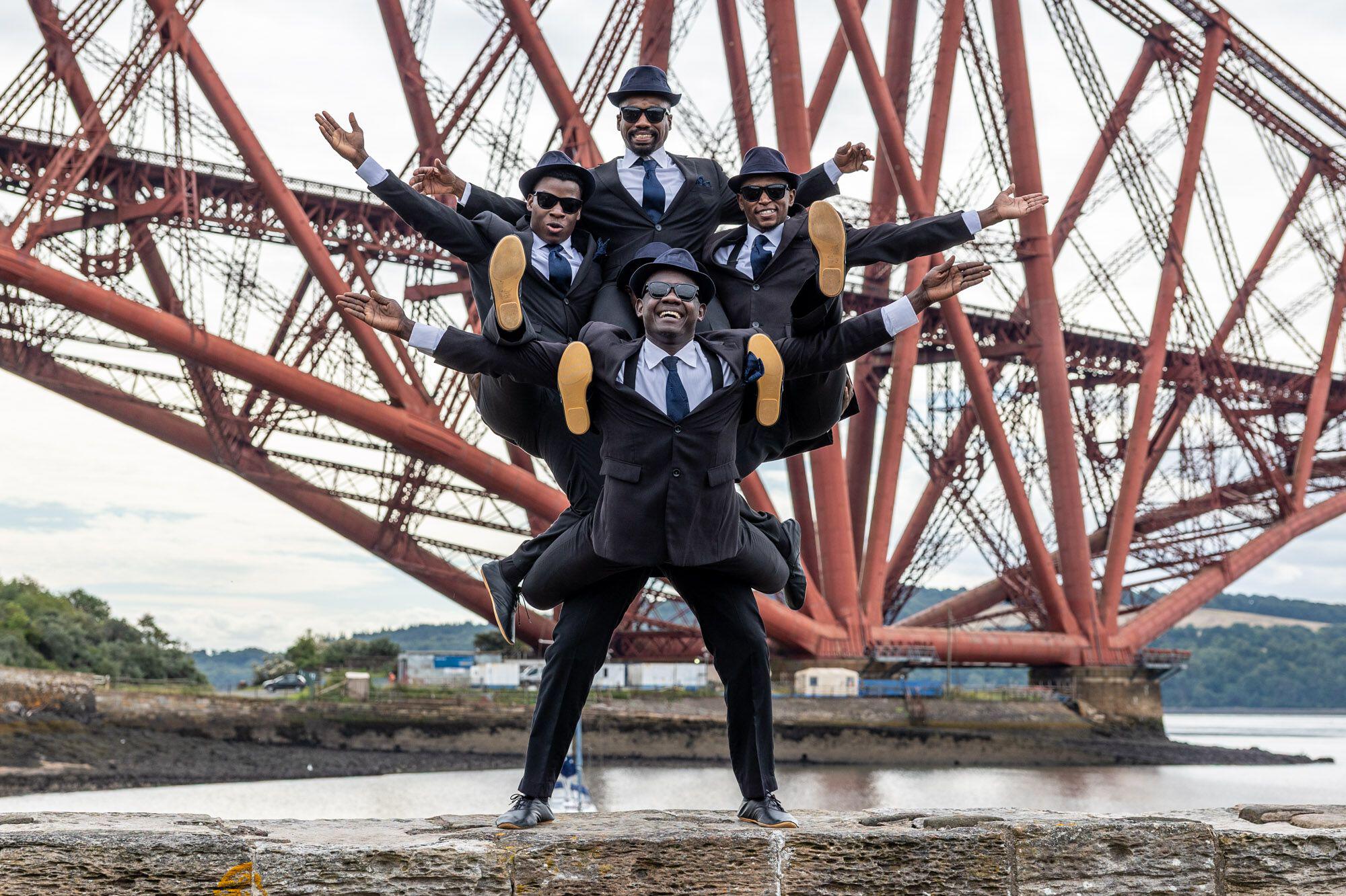 North Queensferry, United Kingdom. 29 July, 2025 Pictured: The Black Blues Brothers in front of the Forth Bridge at North Queensferry, just outside Edinburgh. The Black Blues Brothers are back at the Edinburgh Fringe with a brand-new show, fit for th