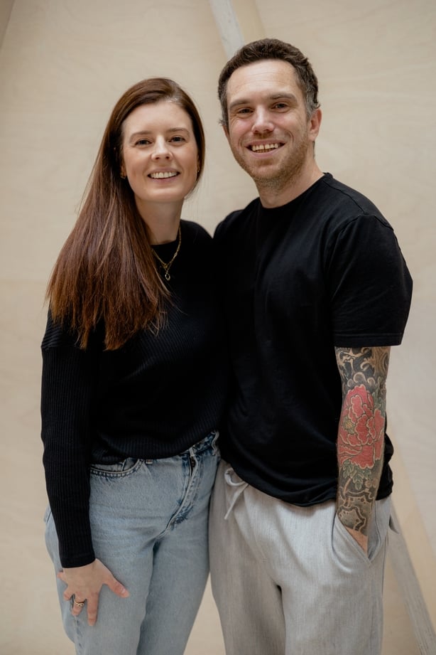 a couple posing for a picture