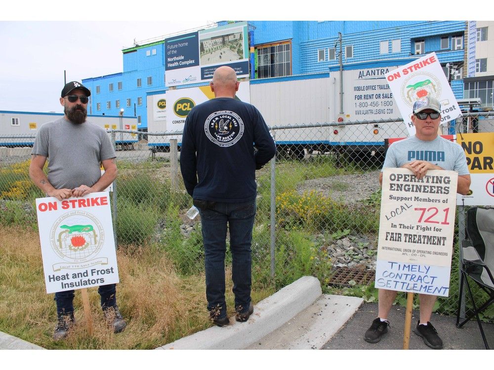 Trades workers from various unions affiliated with the Cape Breton Island Building & Construction Trades Council stage strike action outside the under-construction Northside Health Complex in the Northside Business Park on July 7. A tentative agreement has been reached between the trades council and the Nova Scotia Construction Labour Relations Association on Tuesday. IAN NATHANSON/CAPE BRETON POST FILE