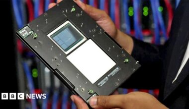 Faisal Islam holds one of the computer's processors