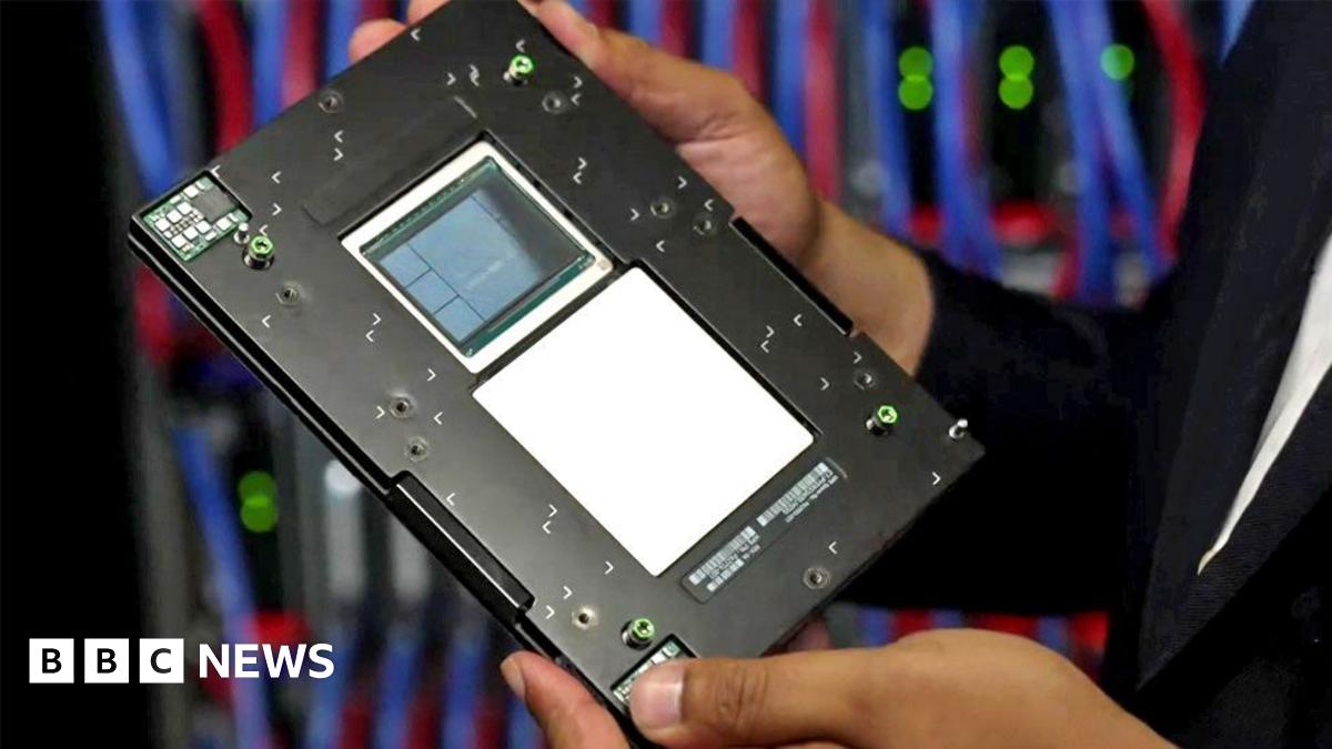 Faisal Islam holds one of the computer's processors