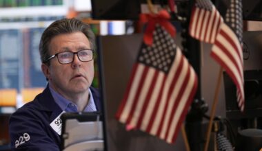 Stocks waver on Wall Street as they head for another winning week