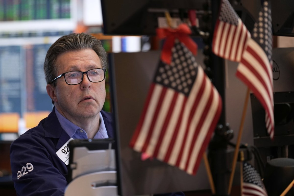 Stocks waver on Wall Street as they head for another winning week