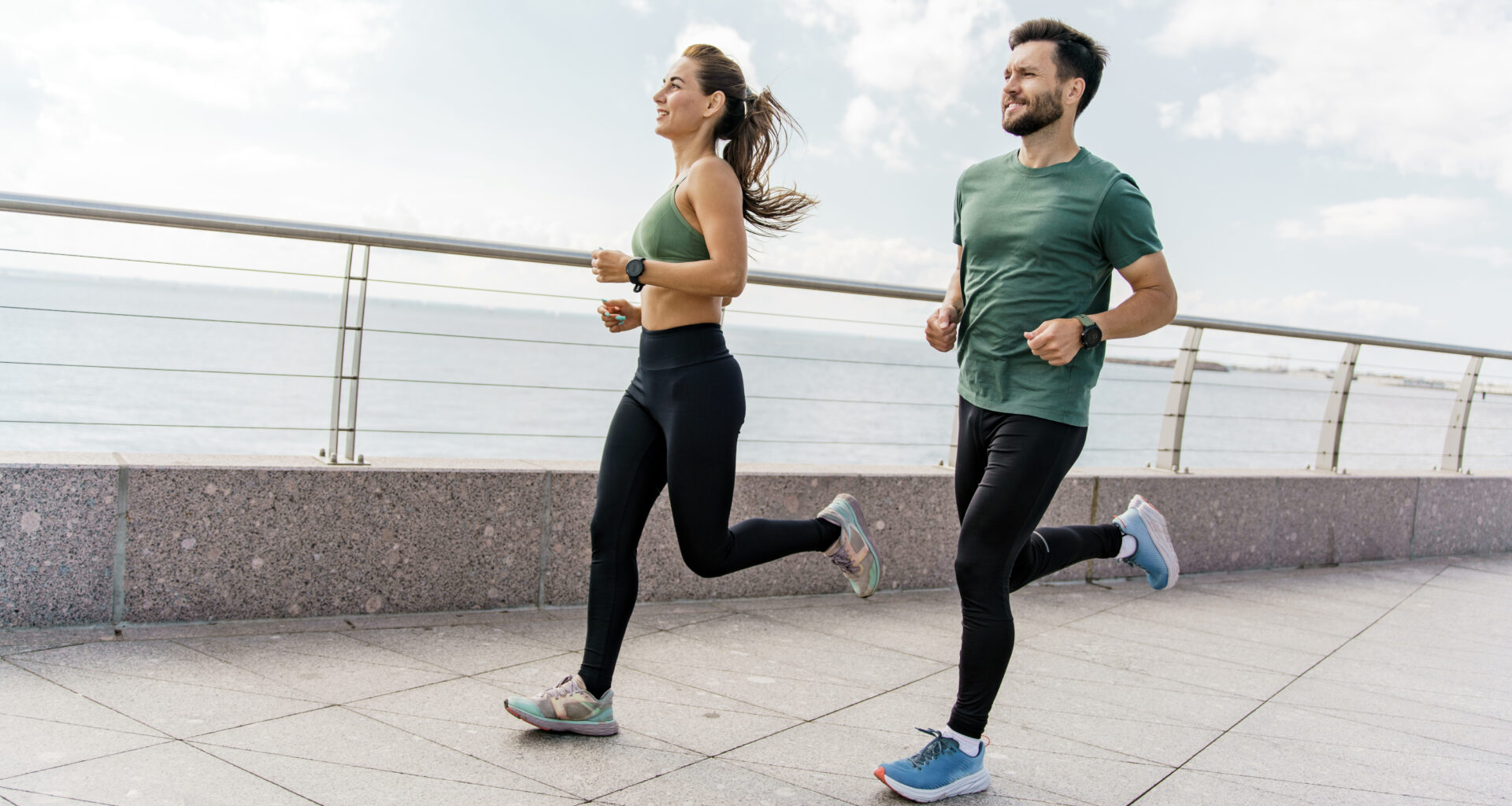 a man and a woman running together