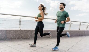 a man and a woman running together