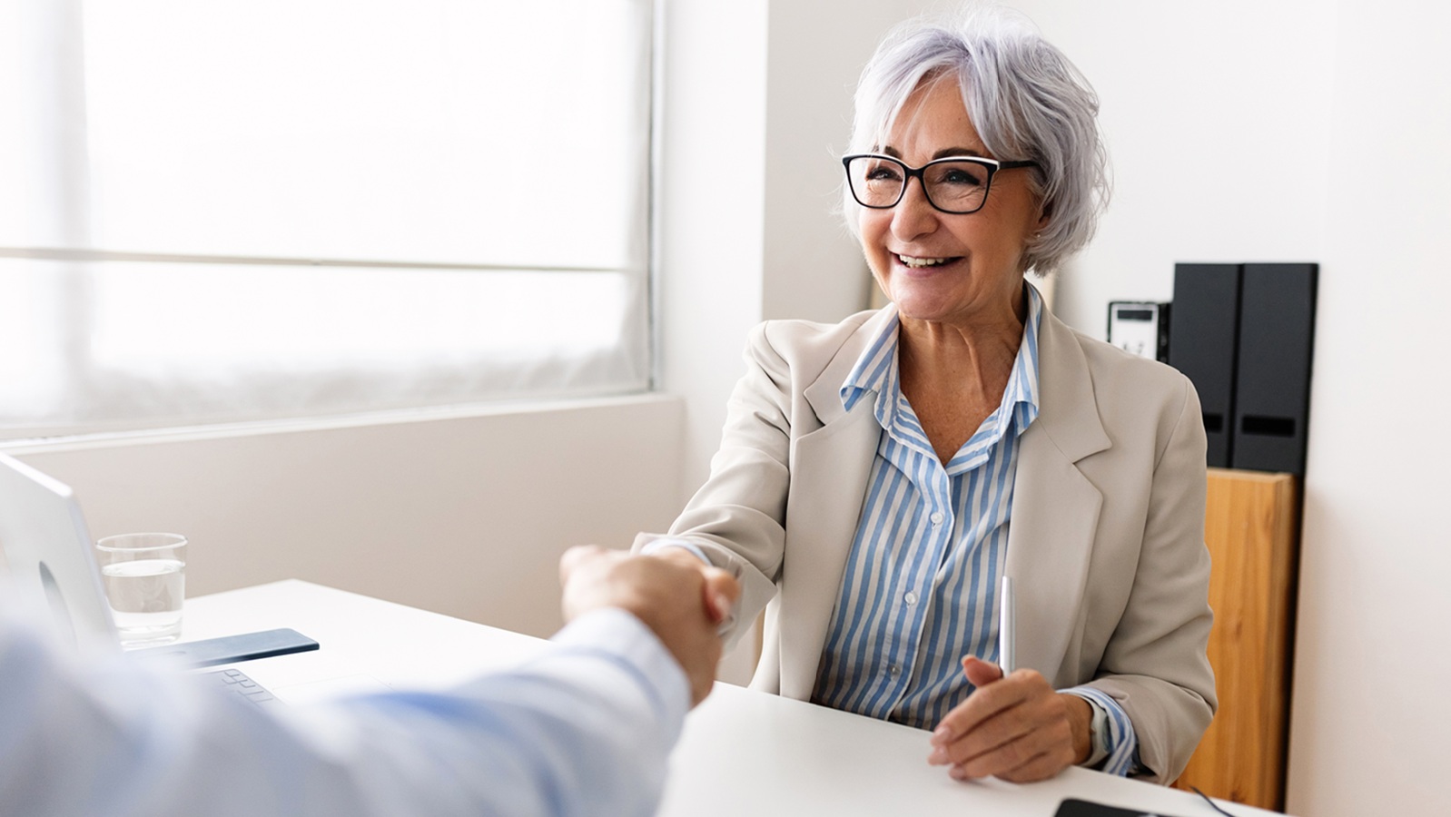 An older businesswoman at a job interview.