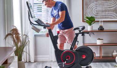 Someone adjusting their Echelon Connect EX-5s-22 bike.