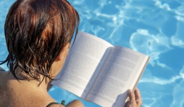 Older lady reading at the pool