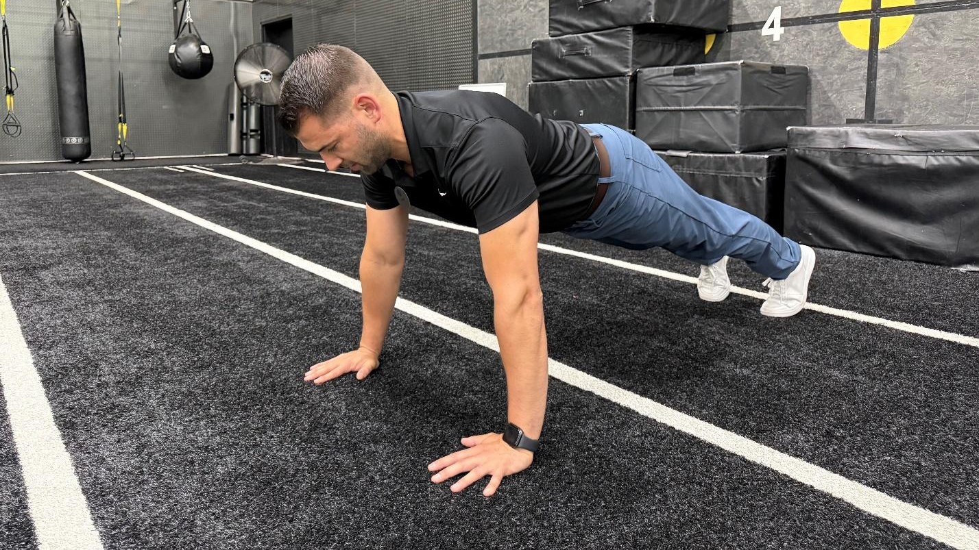 man doing exercise in the gym