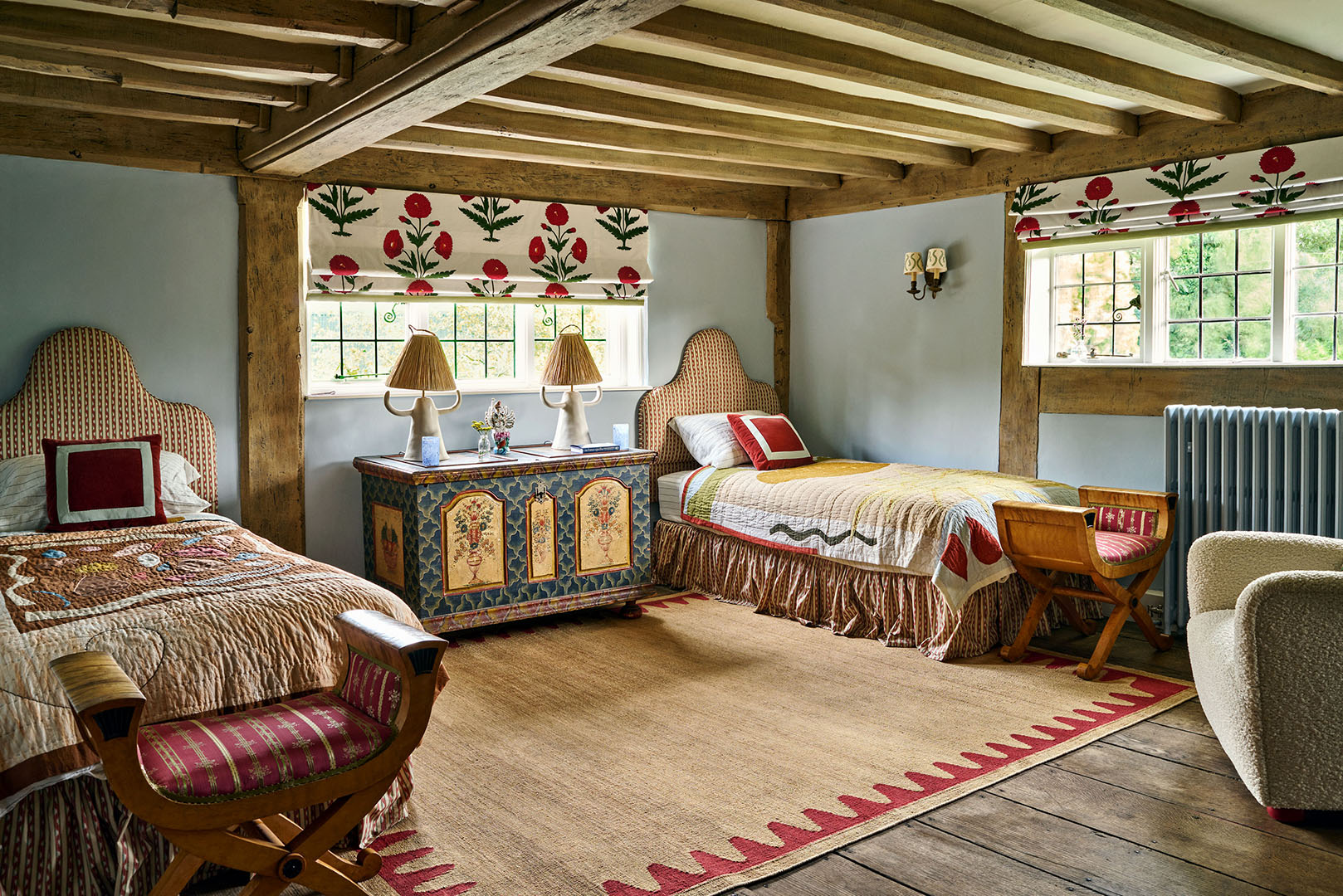 twin bedroom with rustic beams