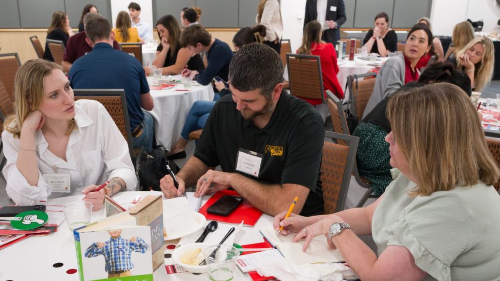 Employers at Employer Summit working on a project