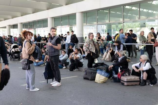 Blackout in Madrid, Spain - 28 apr 2025. Several people wait outside the Atocha train station in Madrid. The Iberian Peninsula lost power around 12:30 p.m. 