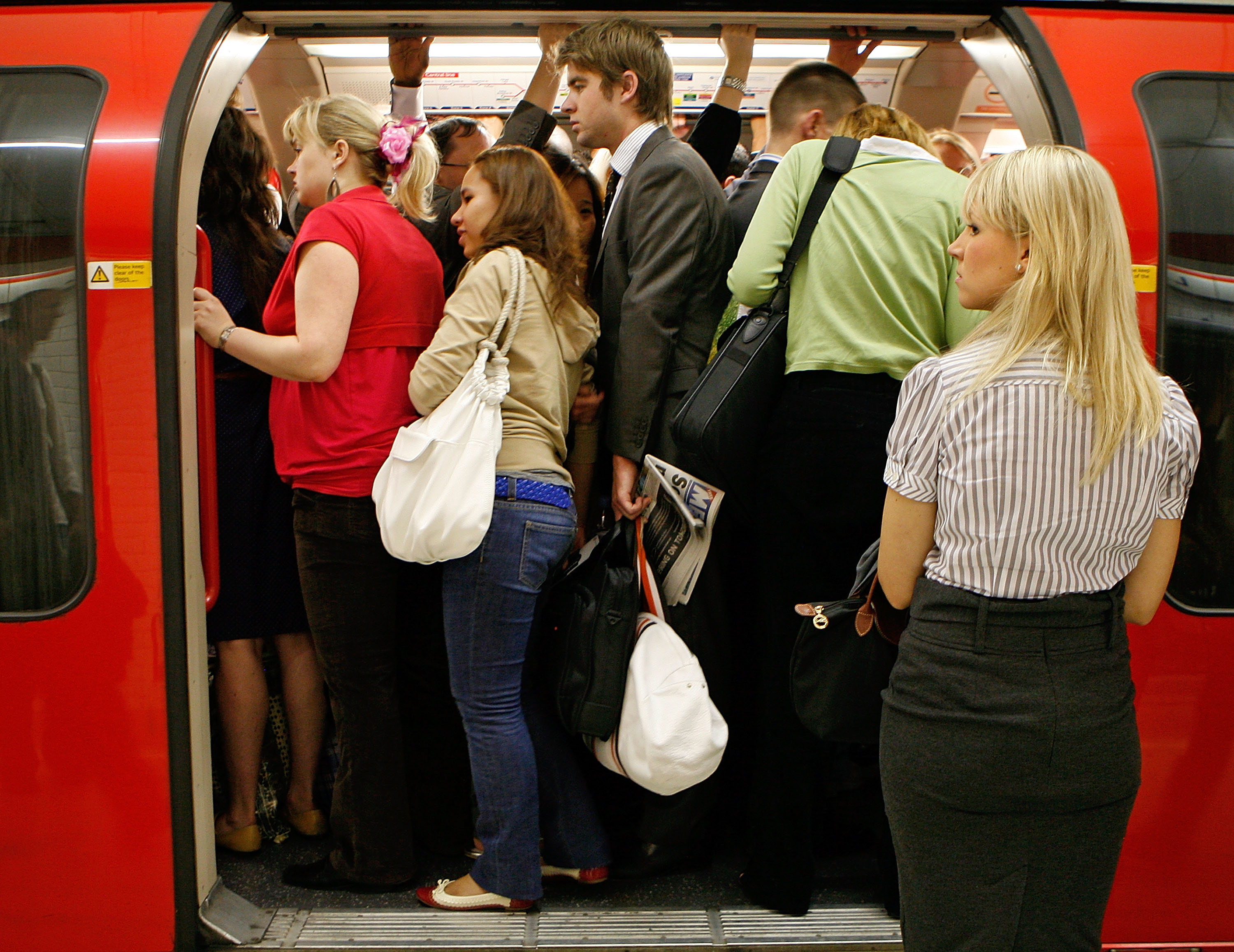 Crowded London Underground train during a bus driver strike.