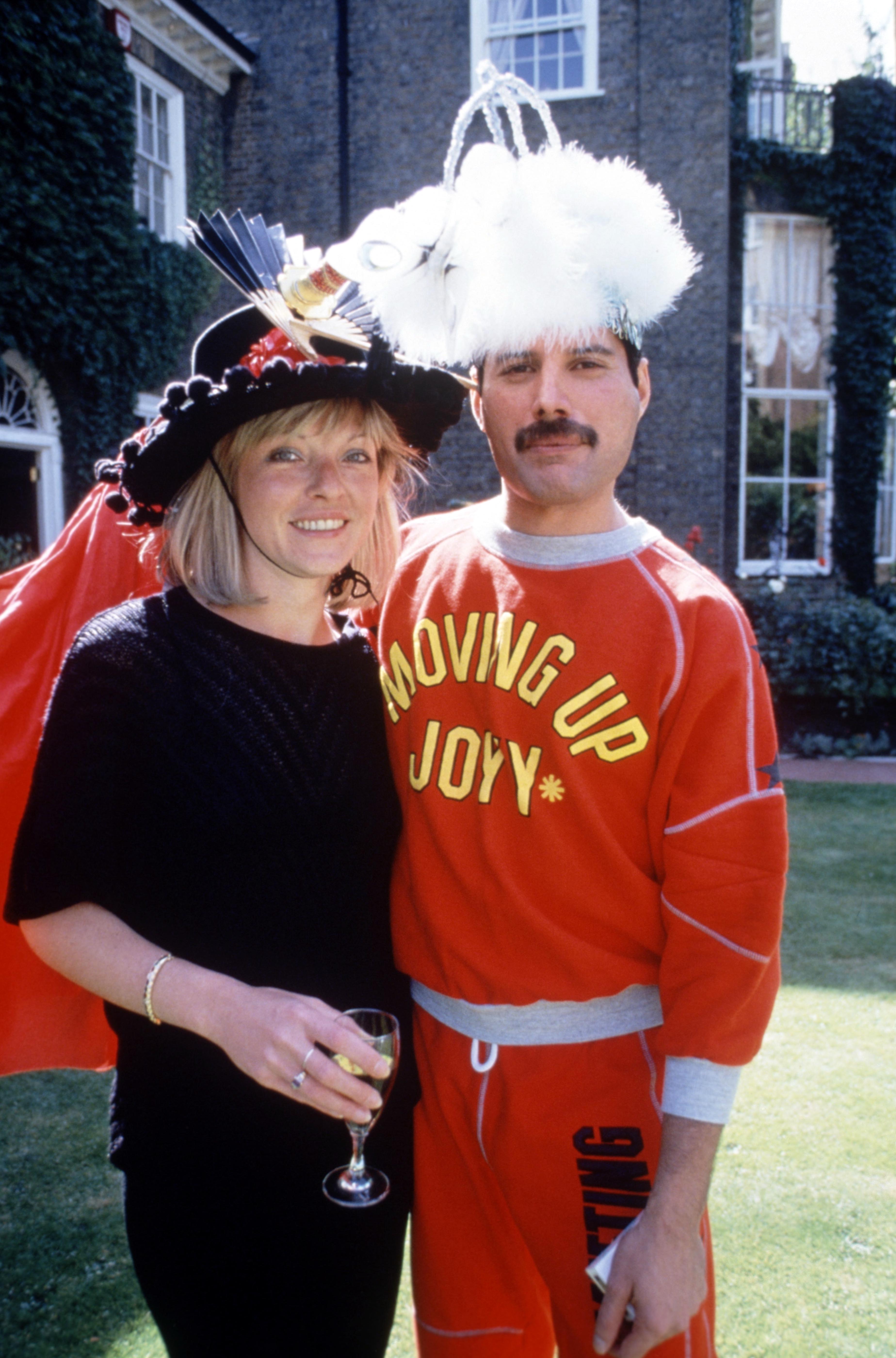 Freddie Mercury and Mary Austin at Mercury's 40th birthday party.