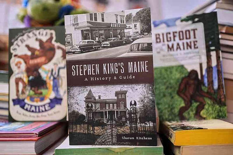 Stephen King's Maine, by Sharon Kitchens, center, and two books by Michelle Souliere are among The History Press books for sale at the Green Hand Bookstore in Portland, Maine, on Thursday, Aug. 7, 2025. (AP Photo/Robert F. Bukaty)