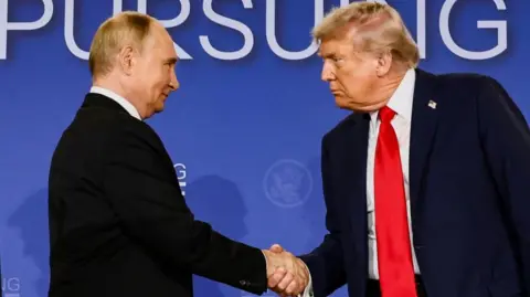 Reuters US President Donald Trump and Russian President Vladimir Putin shake hands during a press conference following their meeting at Joint Base Elmendorf-Richardson, in Anchorage, Alaska
