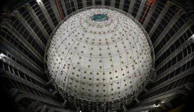 This stitched photo shows the central detector of the Jiangmen Underground Neutrino Observatory under construction in Jiangmen, South China