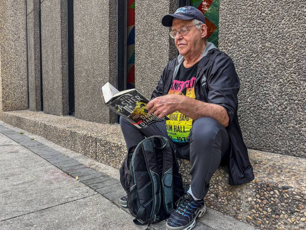 MALAK ABAS / FREE PRESS
John, 71, loves a good book. He’s taken out hundreds from the library, and admits he’s lost at least one.