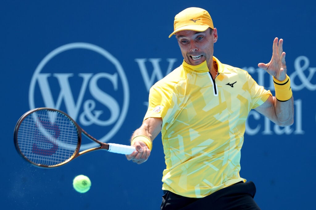 Roberto Bautista Agut returns a shot to Cameron Norrie at the 2025 Cincinnati Open