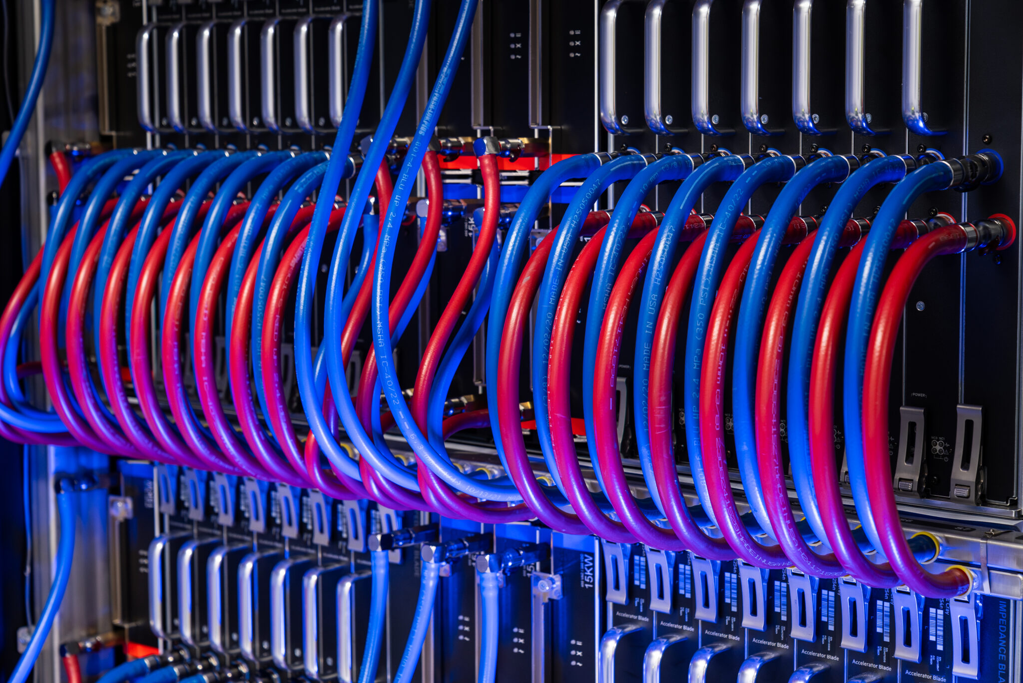 A close-up of the intricate network of liquid-cooling pipes, a crucial component of Isambard-AI’s world-class energy efficiency and ability to pack 440 GPUs per cabinet.