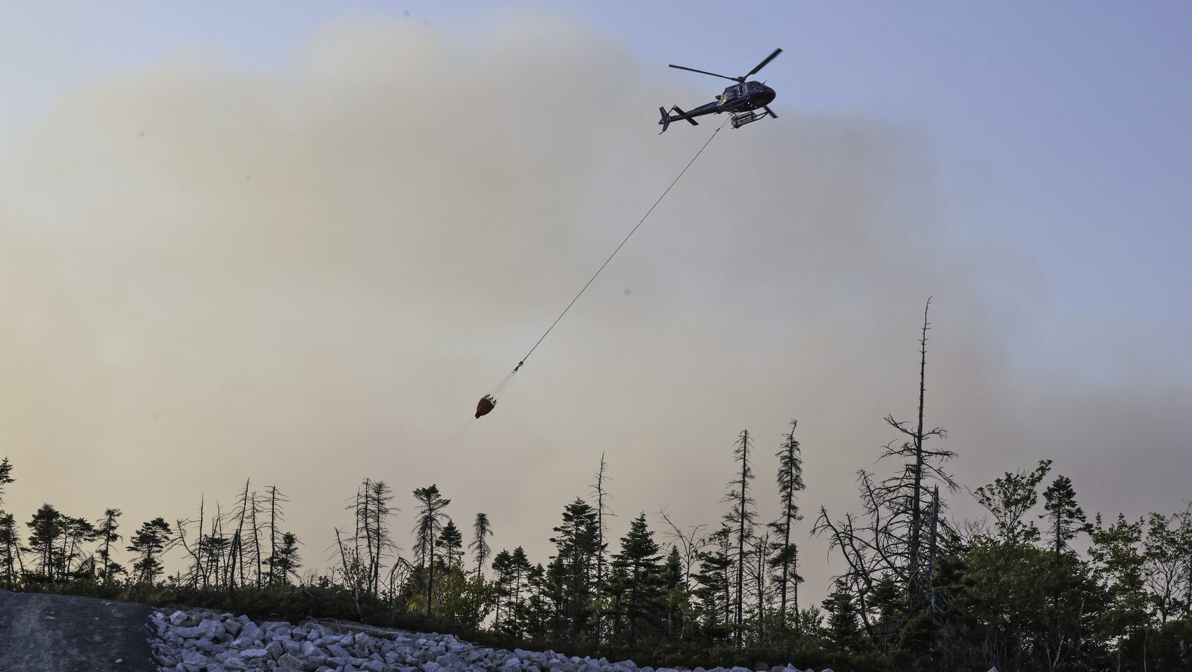 Pilot conscious, talking after helicopter crash at Long Lake wildfire